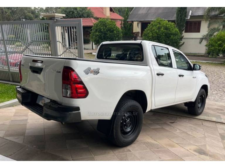 TOYOTA - HILUX - 2021/2021 - Branca - R$ 170.900,00