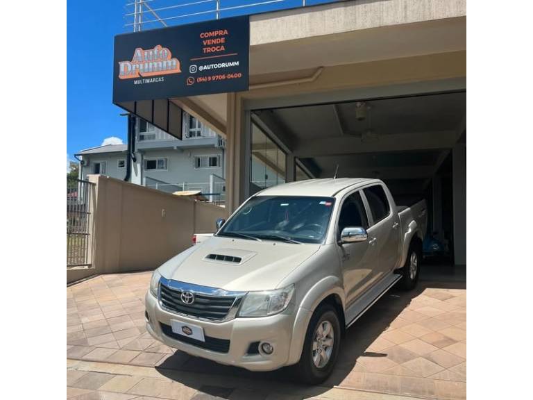 TOYOTA - HILUX - 2014/2014 - Dourada - R$ 143.900,00